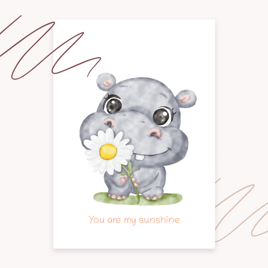 Hippo holding a flower with 'You are my sunshine' text on a light background